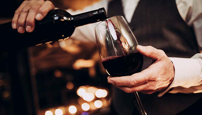 Bottles of wine poured by the glass at Fire & Fir Rooftop Event Banquet Hall in Green Bay, Wisconsin